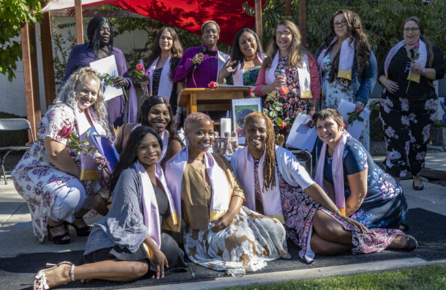 Graduates from Women’s Empowerment’s latest job readiness session gather after their ceremony in September